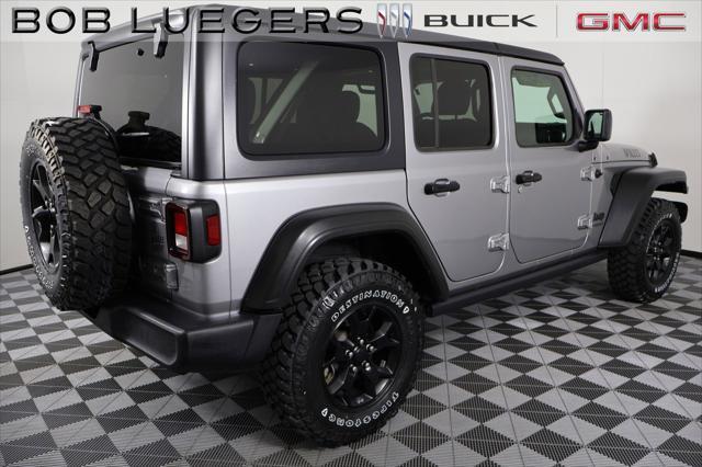 used 2021 Jeep Wrangler Unlimited car, priced at $34,588