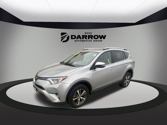 used 2018 Toyota RAV4 car, priced at $19,472