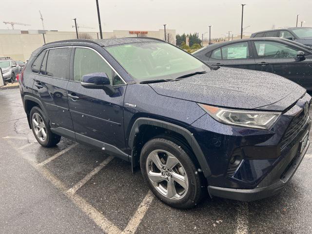 used 2021 Toyota RAV4 Hybrid car, priced at $30,000