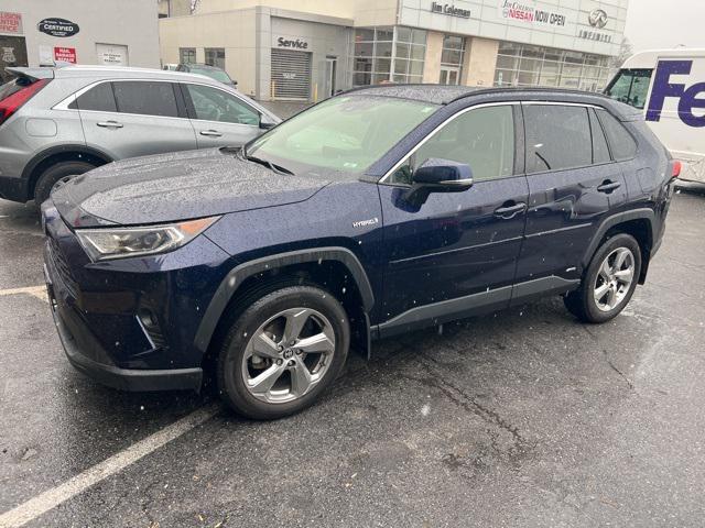 used 2021 Toyota RAV4 Hybrid car, priced at $30,000