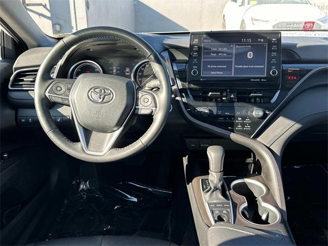 used 2022 Toyota Camry Hybrid car, priced at $29,300