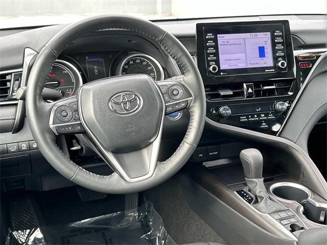 used 2024 Toyota Camry Hybrid car, priced at $28,900