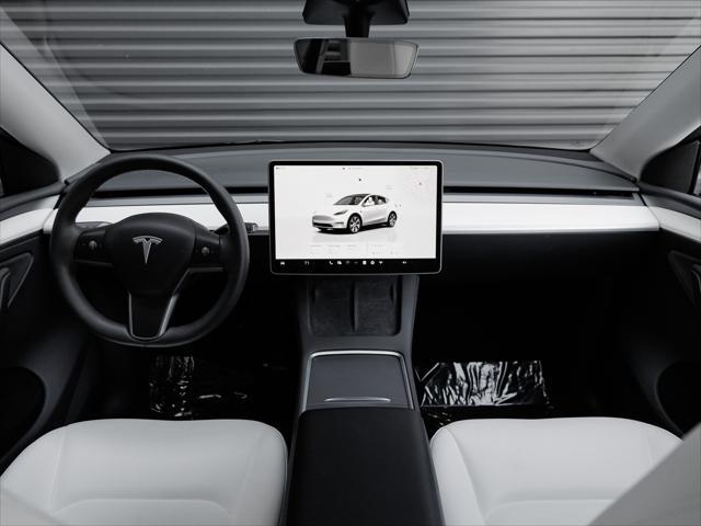 used 2023 Tesla Model Y car, priced at $34,990