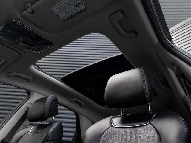 used 2022 Genesis GV70 car, priced at $34,490