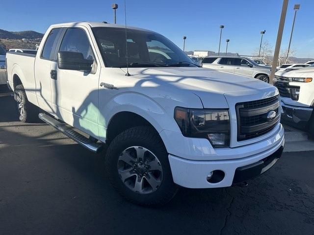 used 2014 Ford F-150 car, priced at $23,433