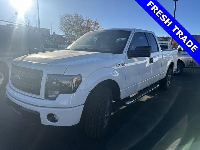 used 2014 Ford F-150 car, priced at $23,433