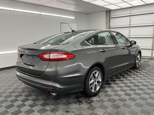 used 2016 Ford Fusion car, priced at $15,000