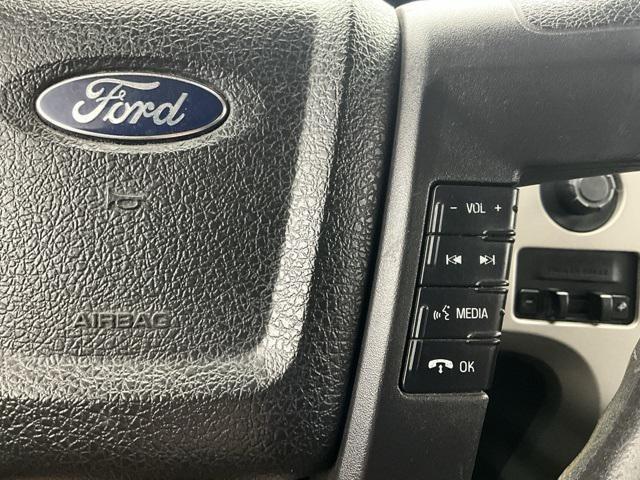 used 2014 Ford F-150 car, priced at $14,000
