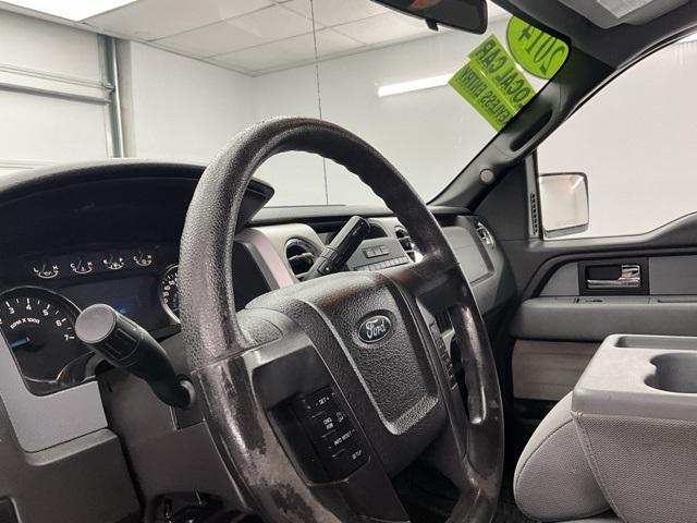 used 2014 Ford F-150 car, priced at $14,000
