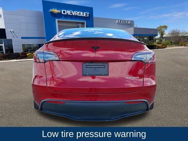 used 2024 Tesla Model Y car, priced at $38,995