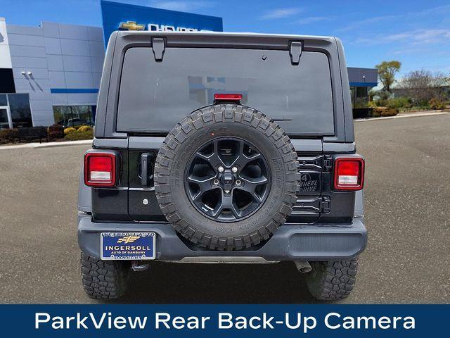 used 2021 Jeep Wrangler Unlimited car, priced at $34,597