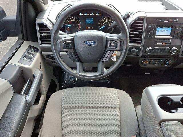 used 2018 Ford F-150 car, priced at $23,590