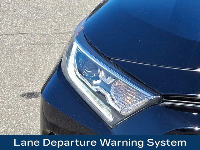used 2021 Toyota RAV4 Hybrid car, priced at $32,825