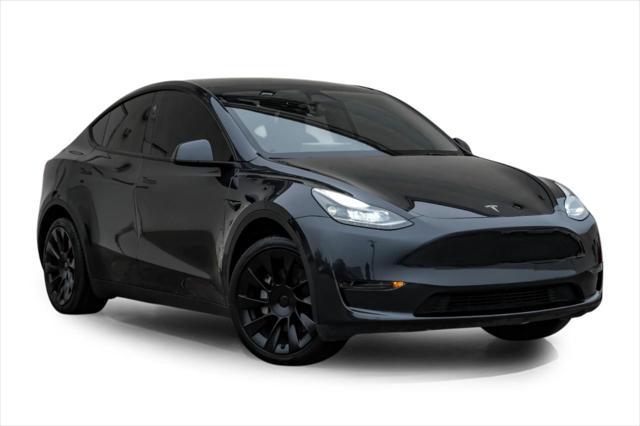 used 2024 Tesla Model Y car, priced at $36,995