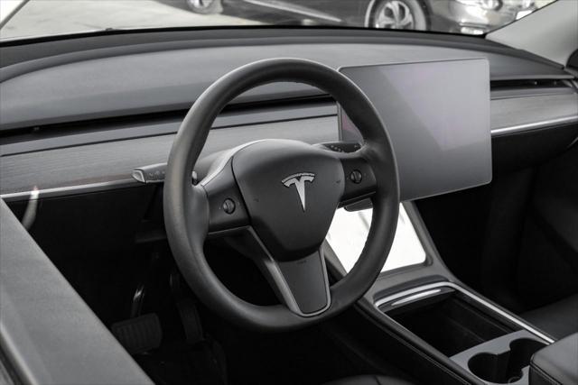 used 2023 Tesla Model Y car, priced at $34,499