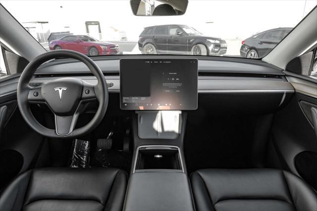 used 2023 Tesla Model Y car, priced at $34,499