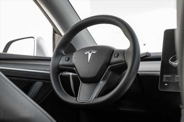 used 2023 Tesla Model Y car, priced at $34,499