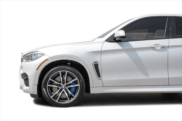 used 2015 BMW X6 M car, priced at $34,599