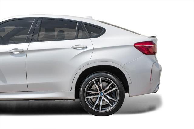 used 2015 BMW X6 M car, priced at $34,599