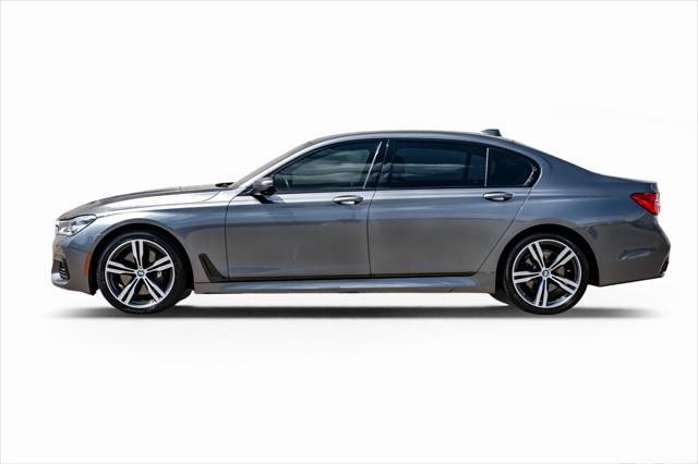 used 2016 BMW 750 car, priced at $25,995