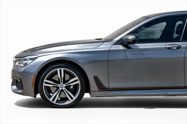 used 2016 BMW 750 car, priced at $25,995