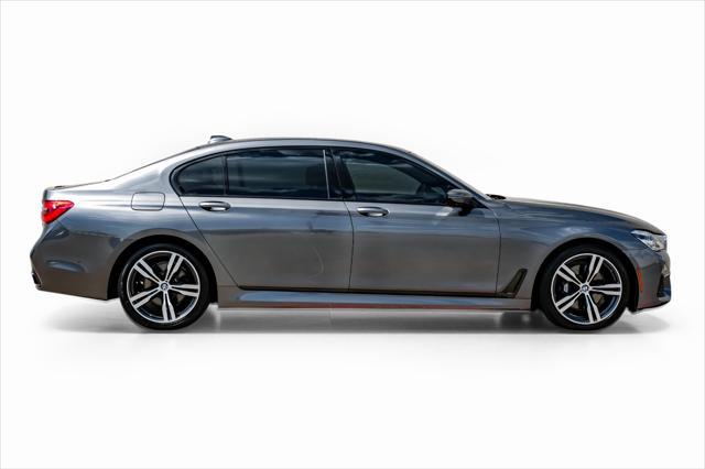 used 2016 BMW 750 car, priced at $25,995