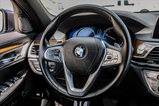 used 2016 BMW 750 car, priced at $25,995