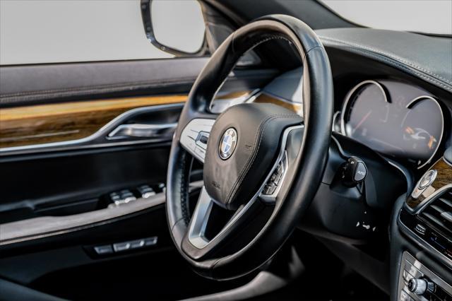 used 2016 BMW 750 car, priced at $25,995