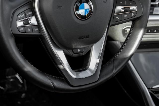 used 2022 BMW 230 car, priced at $29,499