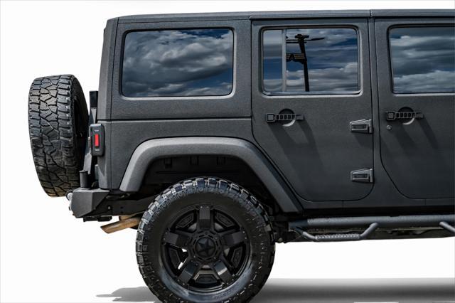 used 2012 Jeep Wrangler Unlimited car, priced at $15,499