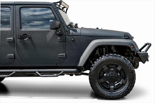 used 2012 Jeep Wrangler Unlimited car, priced at $15,499