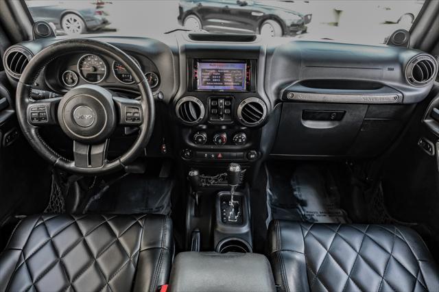used 2012 Jeep Wrangler Unlimited car, priced at $15,499