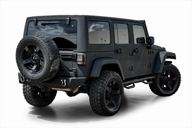 used 2012 Jeep Wrangler Unlimited car, priced at $15,499