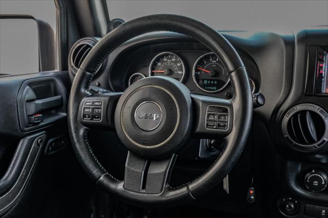 used 2012 Jeep Wrangler Unlimited car, priced at $15,499