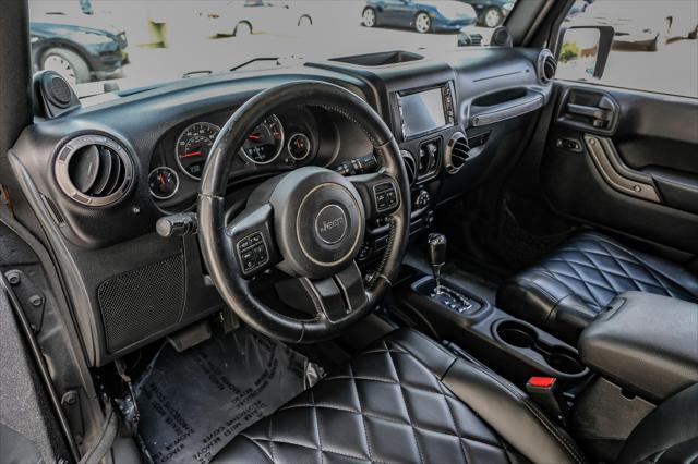 used 2012 Jeep Wrangler Unlimited car, priced at $15,499