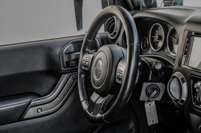 used 2012 Jeep Wrangler Unlimited car, priced at $15,499