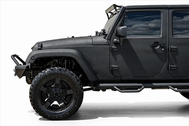 used 2012 Jeep Wrangler Unlimited car, priced at $15,499