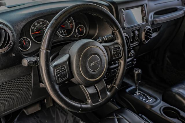 used 2012 Jeep Wrangler Unlimited car, priced at $15,499