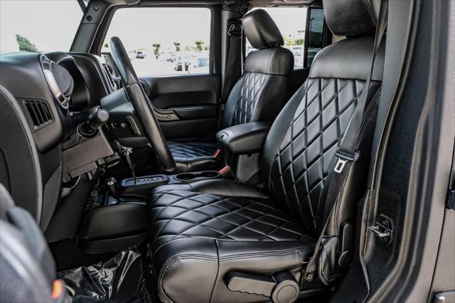 used 2012 Jeep Wrangler Unlimited car, priced at $15,499