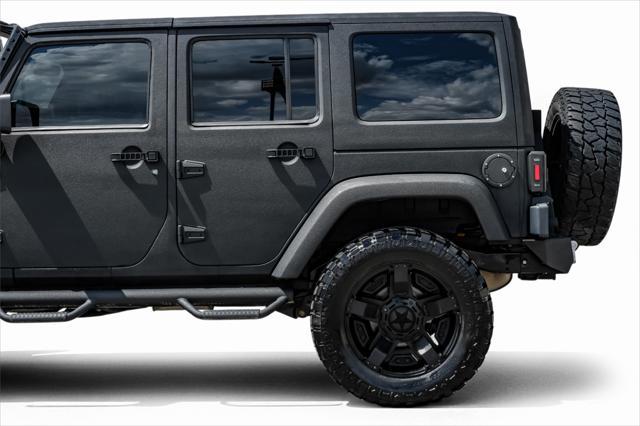 used 2012 Jeep Wrangler Unlimited car, priced at $15,499