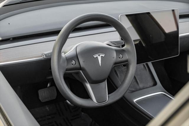 used 2023 Tesla Model 3 car, priced at $27,499