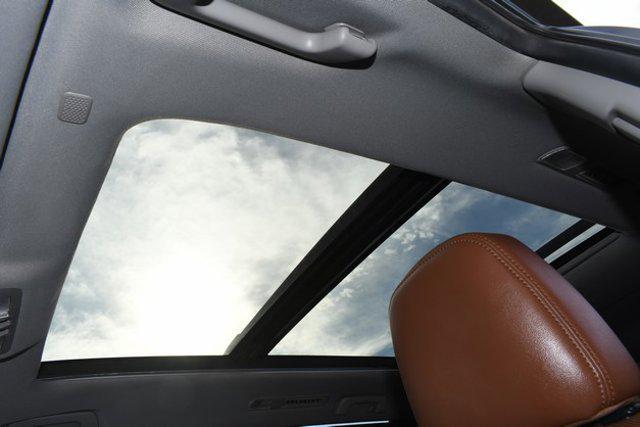 used 2019 Toyota Highlander Hybrid car, priced at $25,499