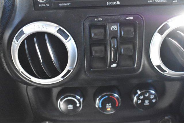 used 2016 Jeep Wrangler Unlimited car, priced at $14,496