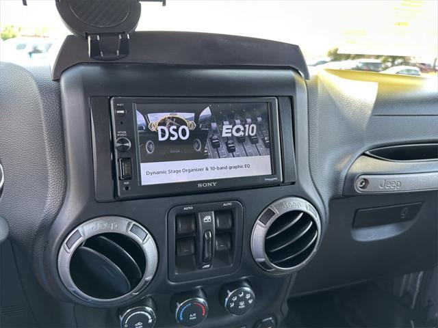 used 2014 Jeep Wrangler Unlimited car, priced at $15,988