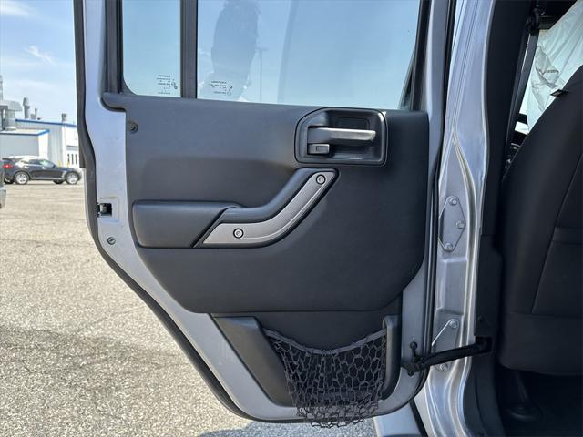 used 2014 Jeep Wrangler Unlimited car, priced at $15,988
