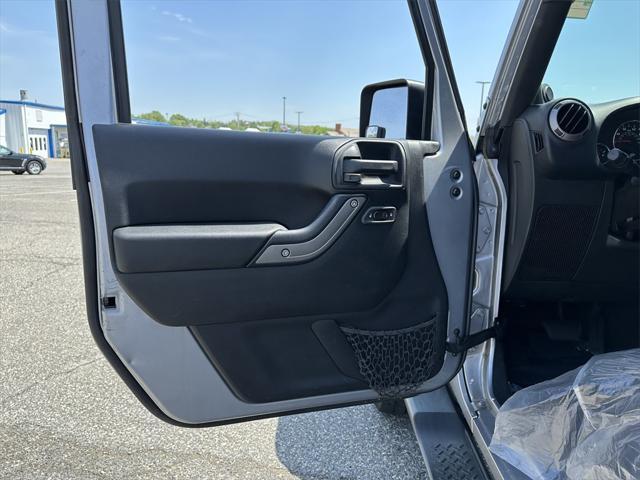 used 2014 Jeep Wrangler Unlimited car, priced at $15,988