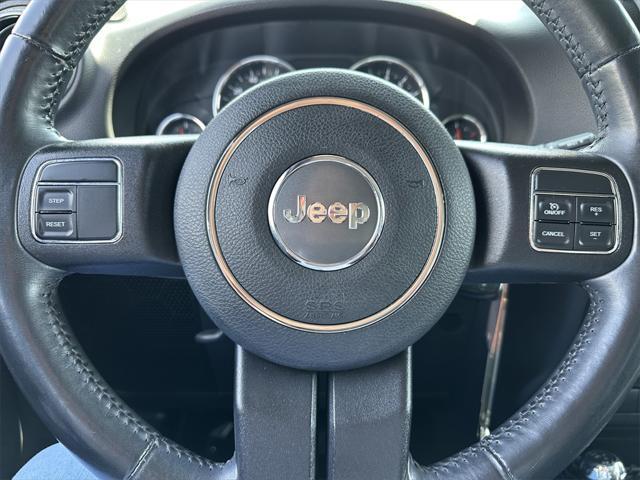 used 2014 Jeep Wrangler Unlimited car, priced at $15,988