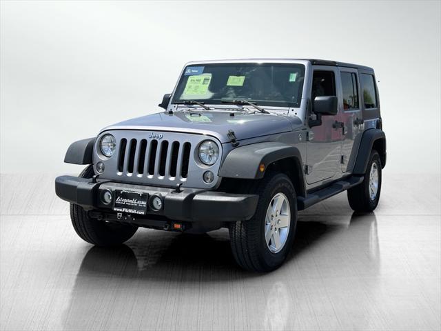 used 2014 Jeep Wrangler Unlimited car, priced at $15,988