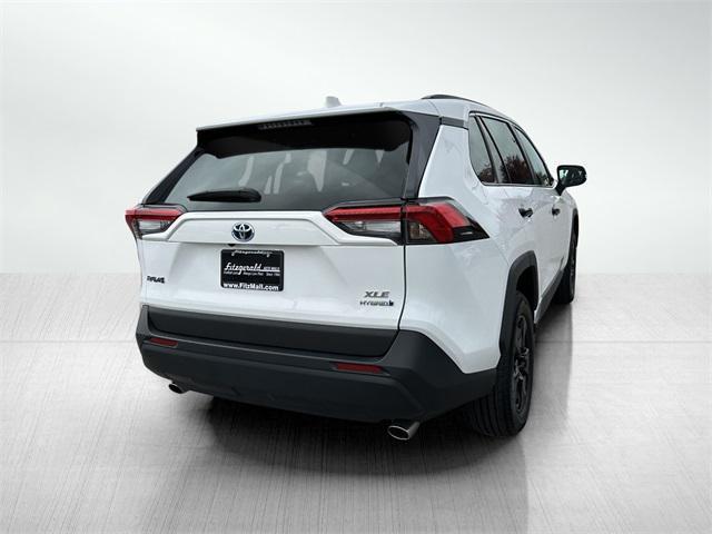 used 2024 Toyota RAV4 Hybrid car, priced at $34,877