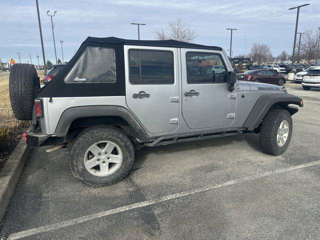 used 2014 Jeep Wrangler Unlimited car, priced at $16,997